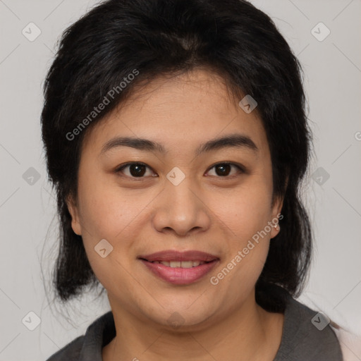 Joyful asian young-adult female with medium  brown hair and brown eyes