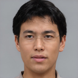 Neutral asian young-adult male with short  brown hair and brown eyes