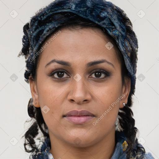 Joyful latino young-adult female with long  brown hair and brown eyes