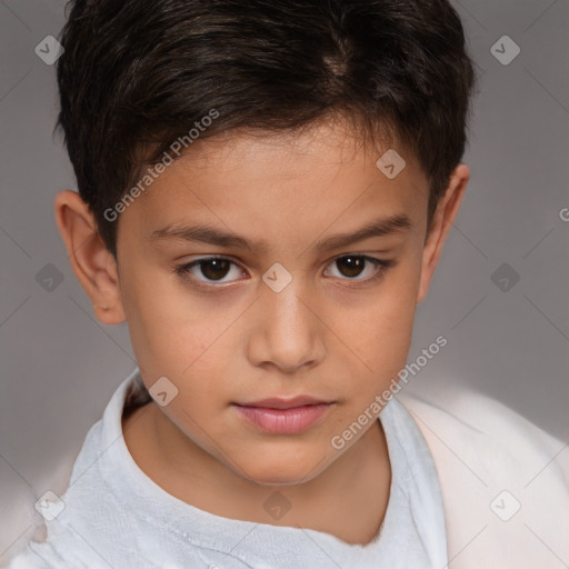 Joyful white child male with short  brown hair and brown eyes