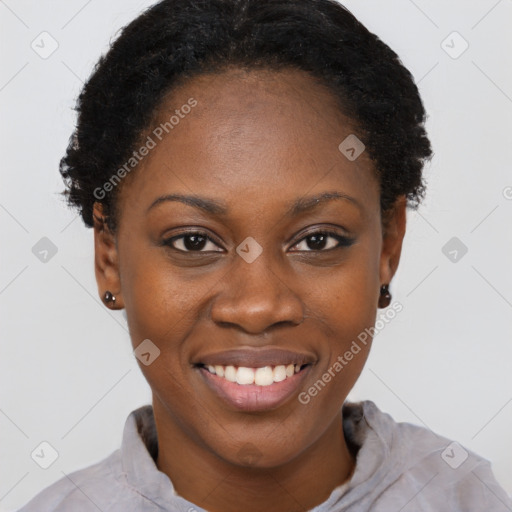 Joyful black young-adult female with short  black hair and brown eyes