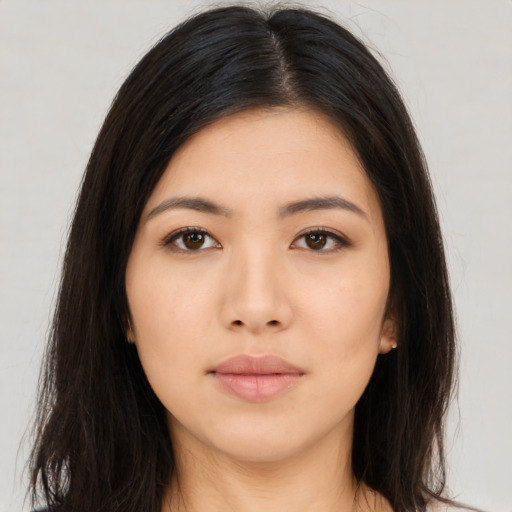 Neutral asian young-adult female with long  brown hair and brown eyes