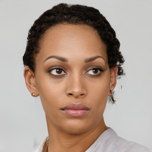 Neutral black young-adult female with short  brown hair and brown eyes