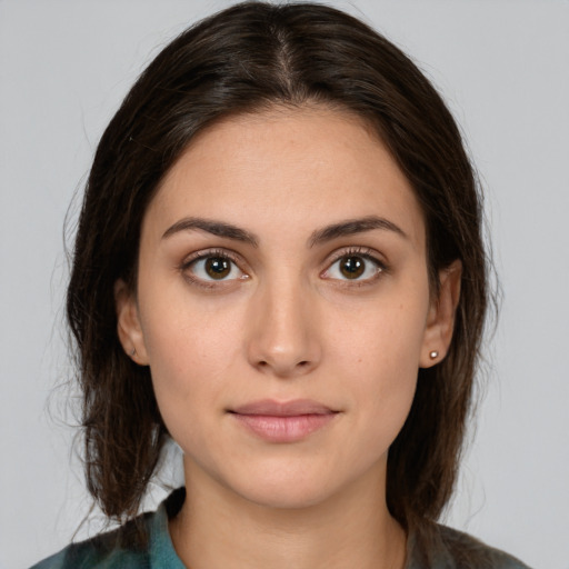 Neutral white young-adult female with medium  brown hair and brown eyes