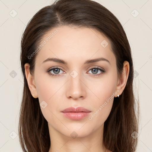 Neutral white young-adult female with long  brown hair and brown eyes