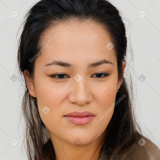 Joyful asian young-adult female with long  brown hair and brown eyes