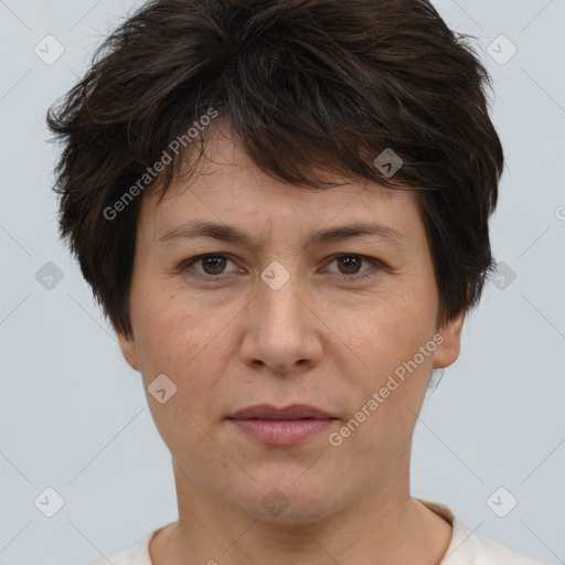 Joyful white adult female with short  brown hair and brown eyes