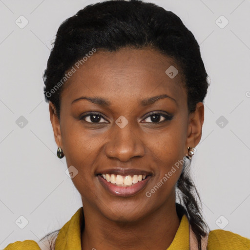 Joyful black young-adult female with short  black hair and brown eyes