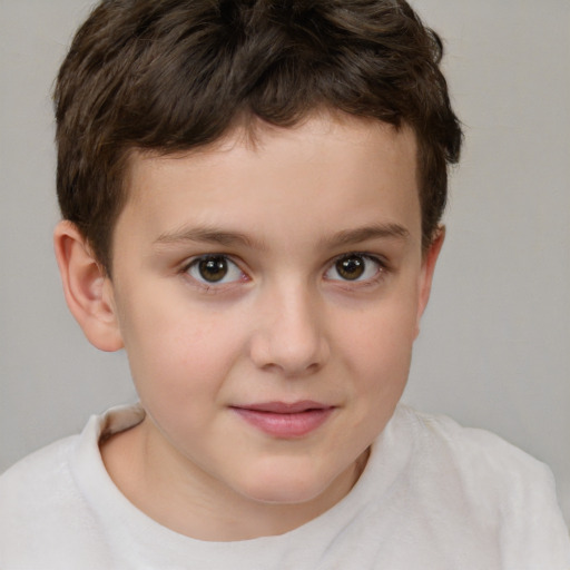 Joyful white child male with short  brown hair and brown eyes