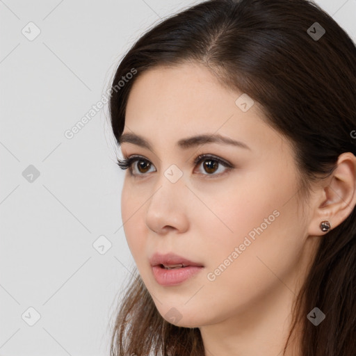 Neutral white young-adult female with long  brown hair and brown eyes