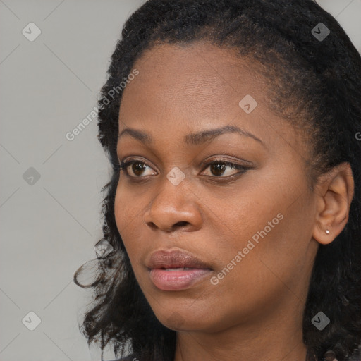 Neutral black young-adult female with long  black hair and brown eyes