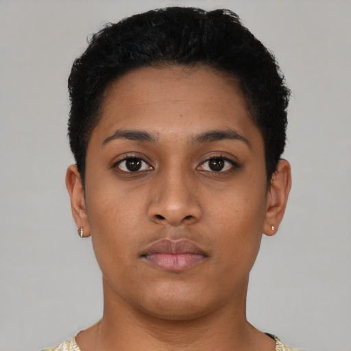 Neutral latino young-adult female with short  brown hair and brown eyes