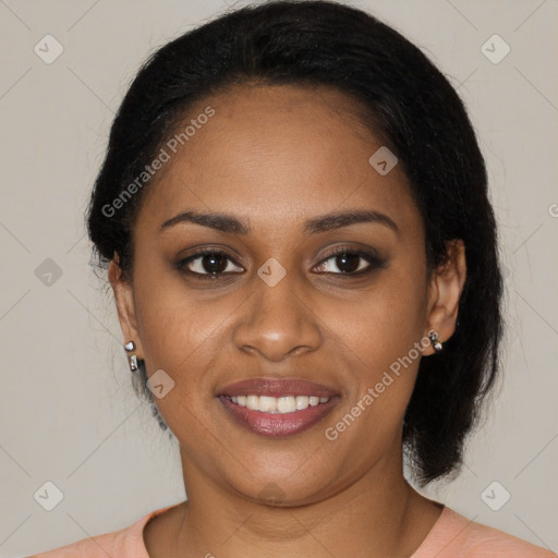 Joyful black young-adult female with medium  black hair and brown eyes