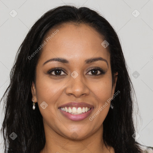 Joyful latino young-adult female with long  brown hair and brown eyes