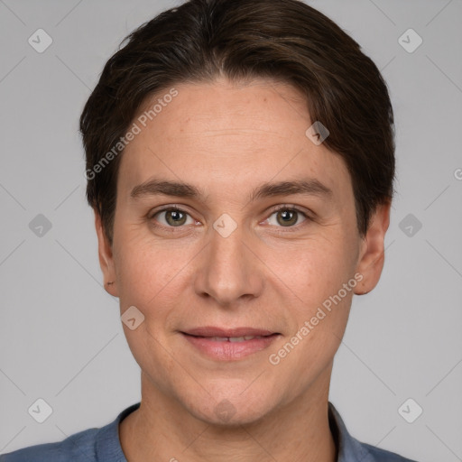 Joyful white adult male with short  brown hair and brown eyes