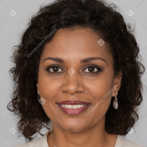 Joyful black young-adult female with medium  brown hair and brown eyes