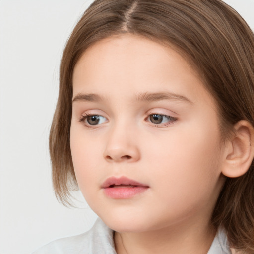 Neutral white child female with medium  brown hair and brown eyes