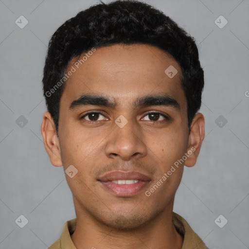 Joyful latino young-adult male with short  black hair and brown eyes