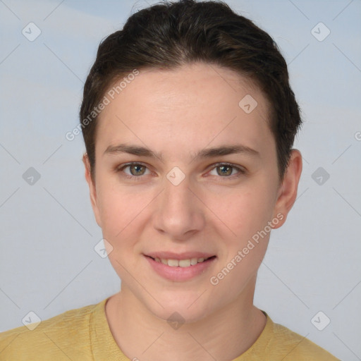 Joyful white young-adult female with short  brown hair and brown eyes