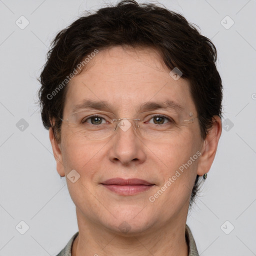 Joyful white adult female with short  brown hair and brown eyes