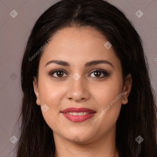 Joyful white young-adult female with long  brown hair and brown eyes