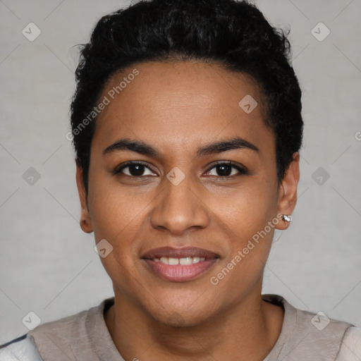 Joyful black young-adult female with short  black hair and brown eyes