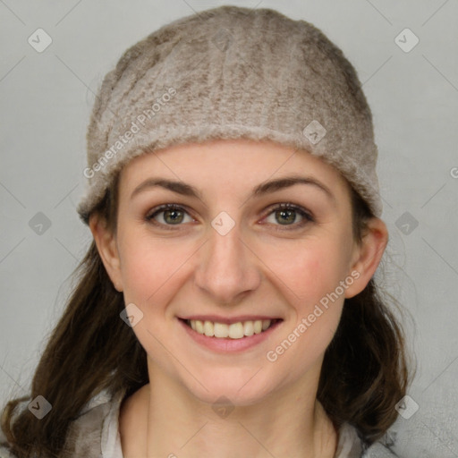 Joyful white young-adult female with medium  brown hair and grey eyes