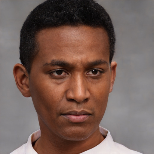 Neutral latino young-adult male with short  brown hair and brown eyes