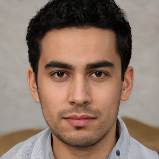 Neutral white young-adult male with short  black hair and brown eyes