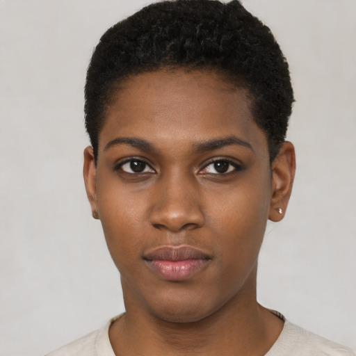 Neutral black young-adult female with short  black hair and brown eyes
