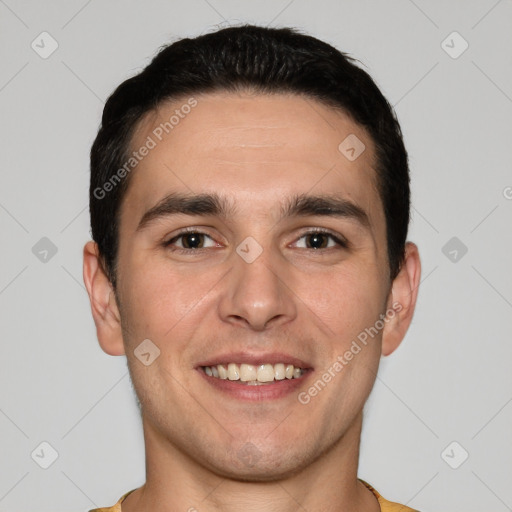 Joyful white young-adult male with short  brown hair and brown eyes