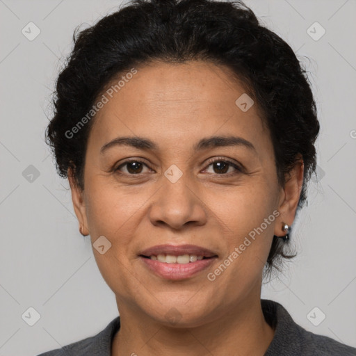 Joyful white adult female with short  brown hair and brown eyes