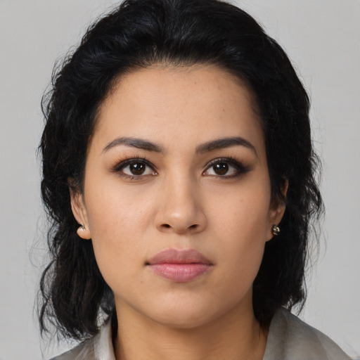 Neutral latino young-adult female with medium  black hair and brown eyes