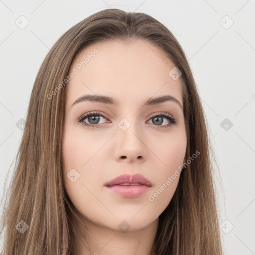 Neutral white young-adult female with long  brown hair and brown eyes