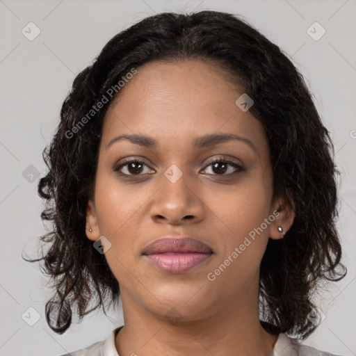 Joyful black young-adult female with medium  brown hair and brown eyes