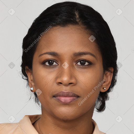 Joyful black young-adult female with medium  black hair and brown eyes