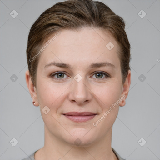 Joyful white young-adult female with short  brown hair and grey eyes