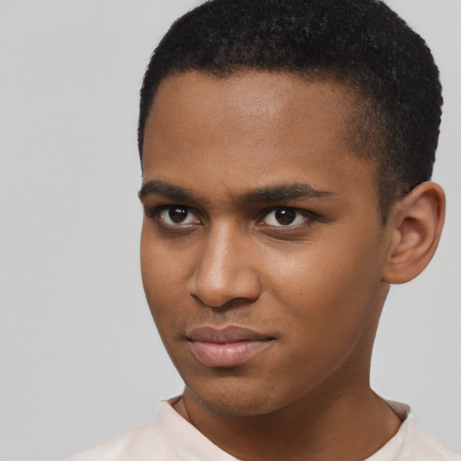 Joyful latino young-adult male with short  brown hair and brown eyes