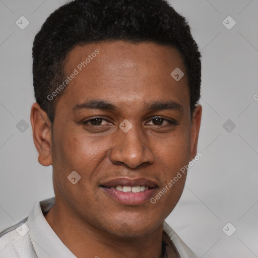 Joyful latino young-adult male with short  brown hair and brown eyes