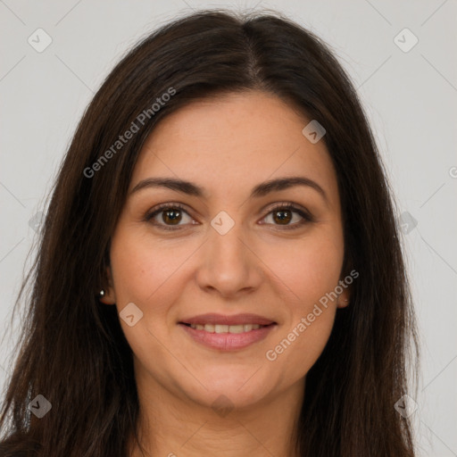 Joyful white young-adult female with long  brown hair and brown eyes