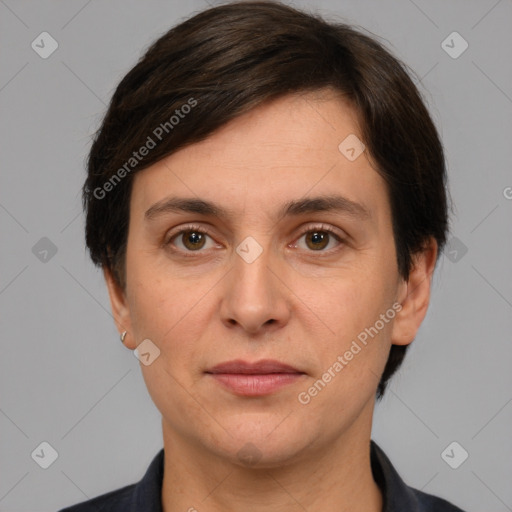 Joyful white adult female with short  brown hair and brown eyes