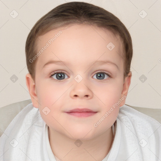 Joyful white child female with short  brown hair and blue eyes