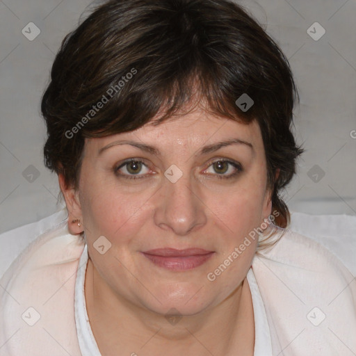 Joyful white adult female with medium  brown hair and blue eyes