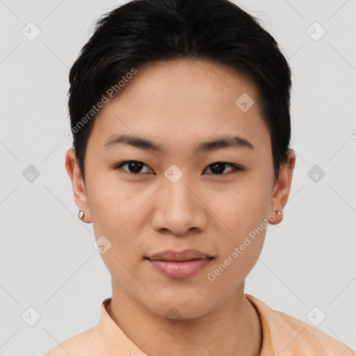 Joyful asian young-adult female with short  black hair and brown eyes