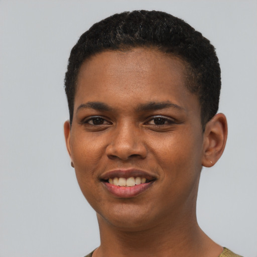 Joyful black young-adult female with short  brown hair and brown eyes