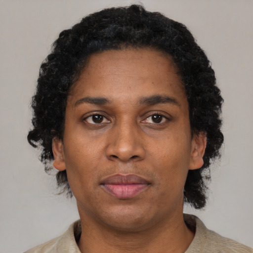 Neutral black adult female with short  brown hair and brown eyes