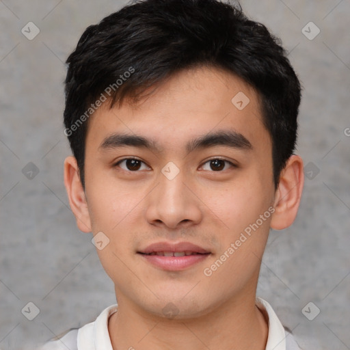 Joyful white young-adult male with short  black hair and brown eyes