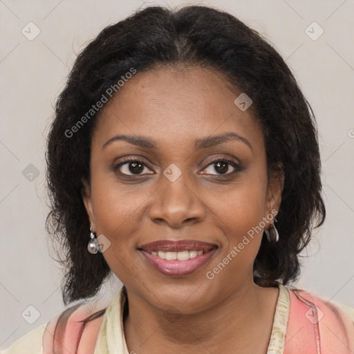 Joyful black young-adult female with medium  brown hair and brown eyes