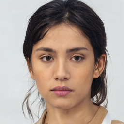 Neutral asian young-adult female with medium  brown hair and brown eyes