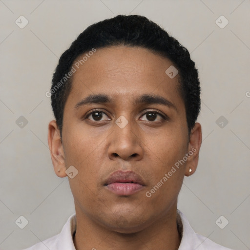 Neutral latino young-adult male with short  black hair and brown eyes